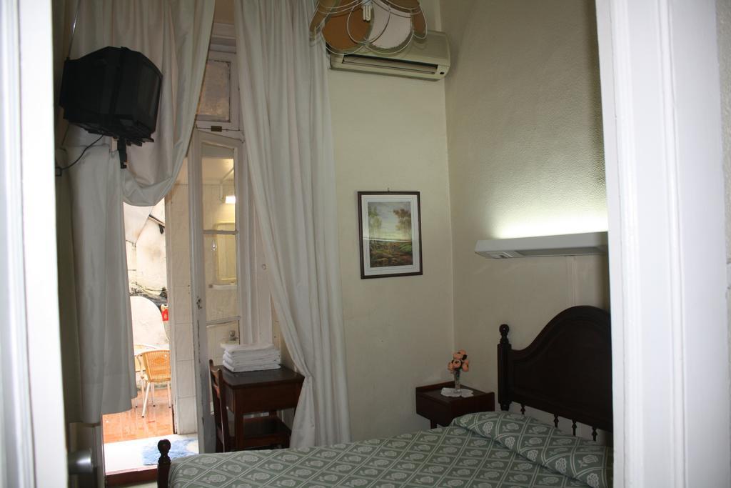 Pensao Residencial Estrela Do Mondego Hotel Lisbon Ruang foto